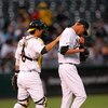 OAKLAND, CA - SEPTEMBER 04:  Catcher Kurt Suzuki #8 of the Oakland Athletics consoles pitcher Clayton Mortensen #62 in the second inning of their game against the Seattle Mariners at the Oakland Coliseum on September 4, 2009 in Oakland, California.  (Phot