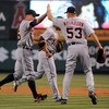 ANAHEIM, CA - AUGUST 25:  Jarrod Washburn #53 of the Detroit Tigers gives a high five to Brandon Inge #15 for his diving play to start a double play against the Los Angeles Angels of Anaheim during the first inning at Angel Stadium of Anaheim on August 25