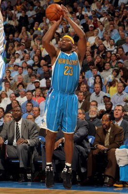 DENVER - APRIL 22:  Devin Brown #23 of the New Orleans Hornets takes a shot against the Denver Nuggets in Game Two of the Western Conference Quarterfinals during the 2009 NBA Playoffs at Pepsi Center on April 22, 2009 in Denver, Colorado. The Nuggets defe