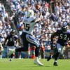 SAN DIEGO , CA - SEPTEMBER 20:  Antonio Gates #85 of the San Diego Chargers catches a pass in front of Ray Lewis #52 of the Baltimore Ravens in the first half at Qualcomm Stadium on September 20, 2009 in San Diego, California. The Ravens defeated the Char