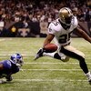 NEW ORLEANS - OCTOBER 18:  Reggie Bush #25 of the New Orleans Saints scores a touchdown over Kevin Dockery #35 of the New York Giants at the Louisiana Superdome on October 18, 2009 in New Orleans, Louisiana.  (Photo by Chris Graythen/Getty Images)
