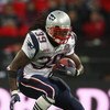LONDON, ENGLAND - OCTOBER 25:  Laurence Maroney (#39) of the New England Patriots runs with the ball during the NFL International Series match between New England Patriots and Tampa Bay Buccaneers at Wembley Stadium on October 25, 2009 in London, England.