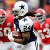 KANSAS CITY, MO - OCTOBER 11:  Running back Marion Barber #24 of the Dallas Cowboys carries the ball upfield during the game against the Kansas City Chiefs on October 11, 2009 at Arrowhead Stadium in Kansas City, Missouri.  (Photo by Jamie Squire/Getty Im
