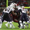 LONDON, ENGLAND - OCTOBER 25:  Kellen Winslow (#82)of Tampa Bay Buccaneers is tackled by the New England Patriots defence during the NFL International Series match between New England Patriots and Tampa Bay Buccaneers at Wembley Stadium on October 25, 200