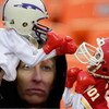 KANSAS CITY, MO - OCTOBER 25:  A wet Kansas City Chiefs fans plays with puppets in the rain during the game between the San Diego Chargers and the Kansas City Chiefs on October 25, 2009 at Arrowhead Stadium in Kansas City, Missouri.  (Photo by Jamie Squir