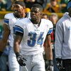 GREEN BAY, WI - OCTOBER 18: Kevin Smith #34 of the Detroit Lions participates in warm-ups before a game against the Green Bay Packers at Lambeau Field on October 18, 2009 in Green Bay, Wisconsin. The Packers defeated the Lions 26-0. (Photo by Jonathan Dan