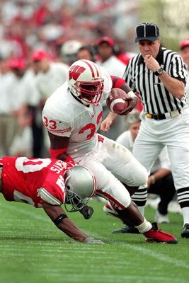 2 Oct 1999: Ron Dayne #33 of the Wisconsin Badgers carries the ball during the game against the Ohio State Buckeyes at the Ohio Stadium in Columbus, Ohio. The Badgers defeated the Buckeyes 42-17. Mandatory Credit: Tom Hauck  /Allsport