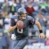 SEATTLE - OCTOBER 18:  Quarterback Matt Hasselbeck #8 of the Seattle Seahawks moves to pass the ball during the game against the Arizona Cardinals on October 18, 2009 at Qwest Field in Seattle, Washington. (Photo by Otto Greule Jr/Getty Images) 