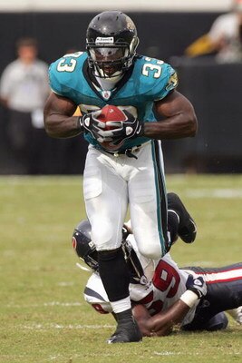 JACKSONVILLE, FL - SEPTEMBER 28:  Greg Jones #33 of the Jacksonville Jaguars carries the ball during the game against the Houston Texans at Jacksonville Municipal Stadium on September 28, 2008 in Jacksonville, Florida.  (Photo by Sam Greenwood/Getty Image