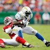 KANSAS CITY, MO - OCTOBER 25:  LaDainian Tomlinson #21 of the San Diego Chargers carries the ball as Demorrio Williams #53 of the Kansas City Chiefs defends during the game on October 25, 2009 at Arrowhead Stadium in Kansas City, Missouri.  (Photo by Jami