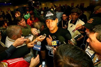 NEW YORK - OCTOBER 25:  Derek Jeter #2 of the New York Yankees is interviewed by the media after defeating the Los Angeles Angels of Anaheim 5-2 in Game Six of the ALCS during the 2009 MLB Playoffs at Yankee Stadium on October 25, 2009 in the Bronx boroug