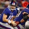 EAST RUTHERFORD, NJ - OCTOBER 25:  Eli Manning #10 of the New York Giants hands off the ball against the Arizona Cardinals on October 25, 2009 at Giants Stadium in East Rutherford, New Jersey.  (Photo by Chris McGrath/Getty Images)