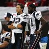 LONDON, ENGLAND - OCTOBER 25:  Tom Brady (#12) and Randy Moss (#81) of the New England Patriots look on during the NFL International Series match between New England Patriots and Tampa Bay Buccaneers at Wembley Stadium on October 25, 2009 in London, Engla