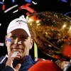 LAS VEGAS - DECEMBER 20:  Head coach Mike Stoops of the Arizona Wildcats is presented with a trophy after defeating the Brigham Young University Cougars 31-21 in the Pioneer Las Vegas Bowl at Sam Boyd Stadium December 20, 2008 in Las Vegas, Nevada.  (Phot