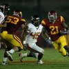 LOS ANGELES, CA - OCTOBER 24:  Running back Allen Bradford #21 of the USC Trojans breaks away from  linebacker David Pa'aluhi #45 of the Oregon State Beavers  on a 43 yard touchdown run in the third quarter on October 24, 2009 at the Los Angeles Coliseum 