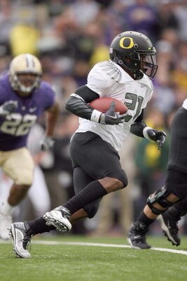 SEATTLE - OCTOBER 24: LaMichael James #21 of the Oregon Ducks carries the ball during the game against the Washington Huskies on October 24, 2009 at Husky Stadium in Seattle, Washington. The Ducks defeated the Huskies 43-19. (Photo by Otto Greule Jr/Getty