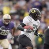 SEATTLE - OCTOBER 24: LaMichael James #21 of the Oregon Ducks carries the ball during the game against the Washington Huskies on October 24, 2009 at Husky Stadium in Seattle, Washington. The Ducks defeated the Huskies 43-19. (Photo by Otto Greule Jr/Getty