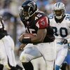 CHARLOTTE, NC - SEPTEMBER 28:  Running back T.J. Duckett #45 of the Atlanta Falcons carries the ball against the Carolina Panthers on September 28, 2003 at Ericsson Stadium in Charlotte, North Carolina. The Panthers defeated the Falcons 23-3. (Photo by Cr