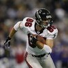 MINNEAPOLIS - DECEMBER 1:  Wide reciever Brian Finneran #86 of the Atlanta Falcons carries the ball during the NFL game against the Minnesota Vikings on December 1, 2002 at the Hubert H. Humphrey Metrodome in Minneapolis, Minnesota. The Falcons beat the V