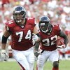 TAMPA, FL - SEPTEMBER 14: Running back Jerious Norwood #32 of the Atlanta Falcons rushes upfield behind the blocking of tackle Todd Weiner against the Tampa Bay Buccaneers at Raymond James Stadium on September 14, 2008 in Tampa, Florida.  (Photo by Al Mes
