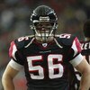 ATLANTA - DECEMBER 28:  Linebacker Keith Brooking #56 of the Atlanta Falcons stands on the field during the game against the Jacksonville Jaguars at the Georgia Dome on December 28, 2003 in Atlanta, Georgia.  The Falcons defeated the Jaguars 21-14.  (Phot