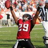 MIAMI - NOVEMBER 6:  Safety Keion Carpenter #29 of the Atlanta Falcons points toward the sky after recovering a key fumble that clinched the win over the Miami Dolphins on November 6, 2005 at Dolphins Stadium in Miami, Florida. The Falcons defeated the Do