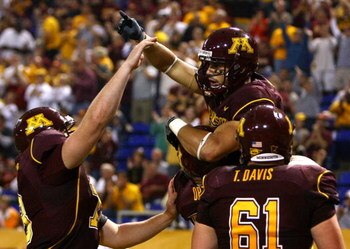MINNEAPOLIS - SEPTEMBER 13:  Wide receiver Eric Decker #7 of the Minnesota Golden Gophers celebrates after scoring a touchdown in the second quarter against the Montana State Bobcats at the Metrodome on September 13, 2008 in Minneapolis, Minnesota.  (Phot