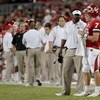 HOUSTON - SEPTEMBER 26:  Head coach Kevin Sumlin and quarterback Case Keenum #7 of the Houston Cougars talks during a timeout while UH plays against the Texas Tech Red Raiders at Robertson Stadium on September 26, 2009 in Houston, Texas.  (Photo by Thomas