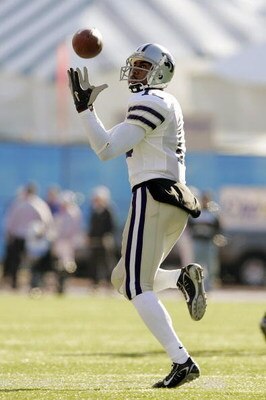 LAWRENCE, KS - NOVEMBER 18: Joshua Moore #13  of the Kansas State Wildcats makes a catch before the game against the Kansas Jayhawks on November 18, 2006 at Memorial Stadium in Lawrence, Kansas.  Kansas won 39-20.  (Photo by Brian Bahr/Getty Images)