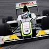 SAO PAULO, BRAZIL - OCTOBER 18:  Jenson Button of Great Britain and Brawn GP drives on his way clinching the F1 World Drivers Championship during the Brazilian Formula One Grand Prix at the Interlagos Circuit on October 18, 2009 in Sao Paulo, Brazil.  (Ph