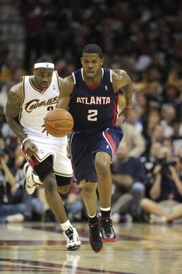 CLEVELAND - MAY 5:  Joe Johnson #2 of the Atlanta Hawks pushes the ball down the court ahead of LeBron James #23 of the Cleveland Cavaliers in Game One of the Eastern Conference Semifinals during the 2009 NBA Playoffs at Quicken Loans Arena on May 5, 2009