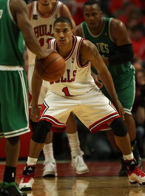 CHICAGO - APRIL 23: Derrick Rose #1 of the Chicago Bulls sets up in a defensive stance against the Boston Celtics in Game Three of the Eastern Conference Quarterfinals during the 2009 NBA Playoffs at the United Center on April 23, 2009 in Chicago, Illinoi