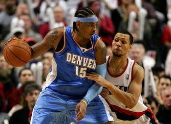 PORTLAND, OR - DECEMBER 21:  Brandon Roy #7 of the Portland Trail Blazers guards Carmelo Anthony #15 of the Denver Nuggets at the Rose Garden on December 21, 2007 in Portland, Oregon.  NOTE TO USER: User expressly acknowledges and agrees that, by download