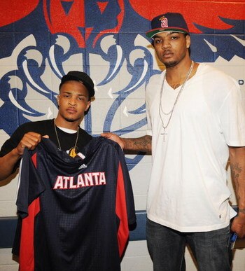 ATLANTA - MAY 24:  Rapper T.I. and Atlanta Hawk, Josh Smith  backstage at the Philips Arena on May 24, 2009 in Atlanta, Georgia.  (Photo by Rick Diamond/Getty Images)