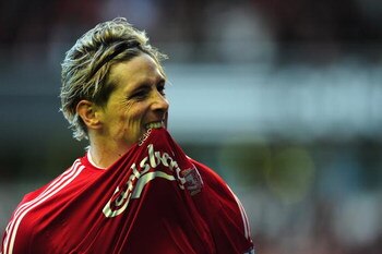 LIVERPOOL, UNITED KINGDOM - OCTOBER 25:  Fernando Torres of Liverpool celebrates scoring the opening goal during the Barclays Premier League match between Liverpool and Manchester United at Anfield on October 25, 2009 in Liverpool, England. (Photo by Cliv