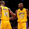 EL SEGUNDO, CA - SEPTEMBER 29:  Kobe Bryant #24 and Ron Artest #37 of the Los Angeles Lakers pose for a photograph during Lakers media day at their training facility on September 29, 2009 in El Segundo, California. NOTE TO USER: User expressly acknowledge