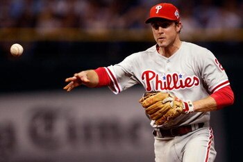 ST PETERSBURG, FL - OCTOBER 23:  Chase Utley #26 of the Philadelphia Phillies throws out Carl Crawford #13 of the Tampa Bay Rays in the bottom of the fifth inning during game two of the 2008 MLB World Series on October 23, 2008 at Tropicana Field in St. P