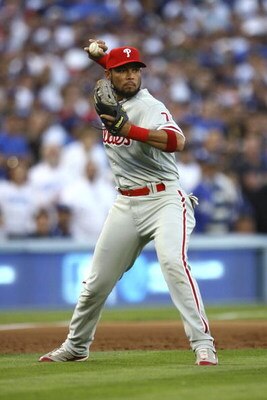 LOS ANGELES, CA - OCTOBER 12:  Pedro Feliz #7 of the Philadelphia Phillies throws the ball against the Los Angeles Dodgers in Game Three of the National League Championship Series during the 2008 MLB playoffs on October 12, 2008 at Dodger Stadium in Los A