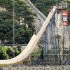 BEIJING, CHINA - JULY 9: Danny Way of the USA rolls in as he prepares to make the first Skateboard jump over the Great Wall Of China, July 9, 2005 in Beijing, China. Way attempted to break three world records by becoming the first person to successfully j