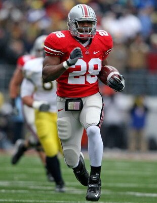 COLUMBUS, OH - NOVEMBER 22:  Chris Wells #28 of the Ohio State Buckeyes runs for a touchdown during the Big Ten Conference game against the Michigan Wolverines at Ohio Stadium on November 22, 2008 in Columbus, Ohio.  (Photo by Andy Lyons/Getty Images)