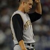 LOS ANGELES, CA - APRIL 16:  Pitcher Paul Maholm #28 of the Pittsburgh Pirates reacts after giving up a bunt to Juan Pierre of the Los Angeles Dodgers in the first inning at Dodger Stadium on April 16, 2008 in Los Angeles, California.  (Photo by Jeff Gros