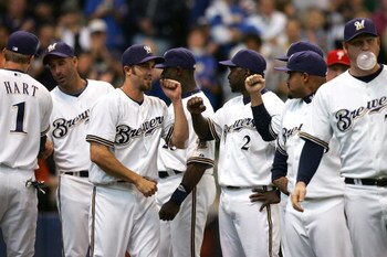 MILWAUKEE - OCTOBER 04:  J.J. Hardy #7 of the Milwaukee Brewers greets Bill Hall #2 during player introductions against the Philadelphia Phillies in Game three of the NLDS during the 2008 MLB playoffs at Miller Park on October 4, 2008 in Milwaukee, Wiscon