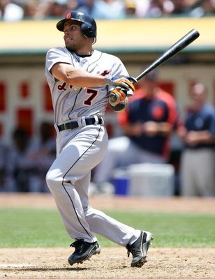 OAKLAND, CA - JULY 05:  Ivan Rodriguez #7 of the Detroit Tigers hits an RBI double in the 3rd inning against the Oakland Athletics at McAfee Coliseum on July 5, 2006 in Oakland, California. The Tigers defeated the A's 10-4.  (Photo by Jed Jacobsohn/Getty 