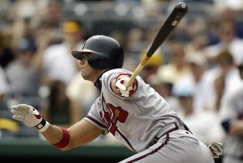 PITTSBURGH, PA - AUGUST 31:  Catcher Javy Lopez #8 of the Atlanta Braves heads to first base during the game against the Pittsburgh Pirates at PNC Park on August 31, 2003 in Pittsburgh, Pennsylvania. The Braves defeated the Pirates 10-4. (Photo by Craig M