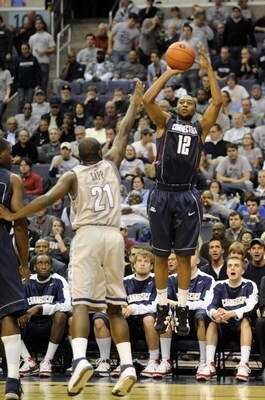 WASHINGTON - JANUARY 12:   A.J. Price #12 of the University of Connecticut takes a jump shot against the Georgetown Hoyas at the Verizon Center on January 12, 2008 in Washington, D.C. (Photo by Greg Fiume/Getty Images)