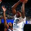 CHAPEL HILL, NC - FEBRUARY 07:  Deon Thompson #21 of the North Carolina Tar Heels grabs a rebound against Jeff Jones #23 of the Virginia Cavaliers during the game on February 7, 2009 at the Dean E. Smith Center in Chapel Hill, North Carolina.  (Photo by K