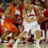 MADISON, WI - FEBRUARY 05: Joe Krabbenhoft #45 of the Wisconsin Badgers looks to pass under pressure from Demetri McCamey #32 of the Illinois Fighting Illini on February 5, 2009 at the Kohl Center in Madison, Wisconsin. Wisconsin defeated Illinois 63-50. 