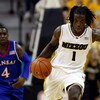 COLUMBIA, MO - FEBRUARY 09:  DeMarre Carroll #1 of the Missouri Tigers controls the ball on a fast break as Sherron Collins #4 of the Kansas Jayhawks chases during the game on February 9, 2009 at Mizzou Arena in Columbia, Missouri.  (Photo by Jamie Squire
