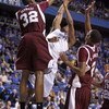 LEXINGTON, KY - FEBRUARY 3:  Jarvis Varnado #32 of the Mississippi State Bulldogs blocks the shot of Ramon Harris #5 of the Kentucky Wildcats during the SEC game at Rupp Arena February 3, 2009 in Lexington, Kentucky. Mississippi State won 66-57.  (Photo b