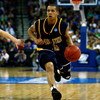 OMAHA, NE - MARCH 20:  Al Fisher #5 of the Kent State Golden Flashes brings the ball up court against the UNLV Runnin' Rebels against the Kent State Golden Flashes during the Midwest Region first round of the 2008 NCAA Men's Basketball Tournament on March
